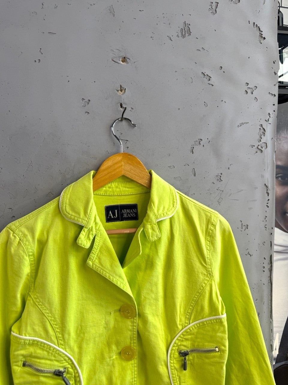 BERLIN VINTAGE CORNER lime green Armani Jeans denim jacket with white piping, button-down front, and zippered pockets.