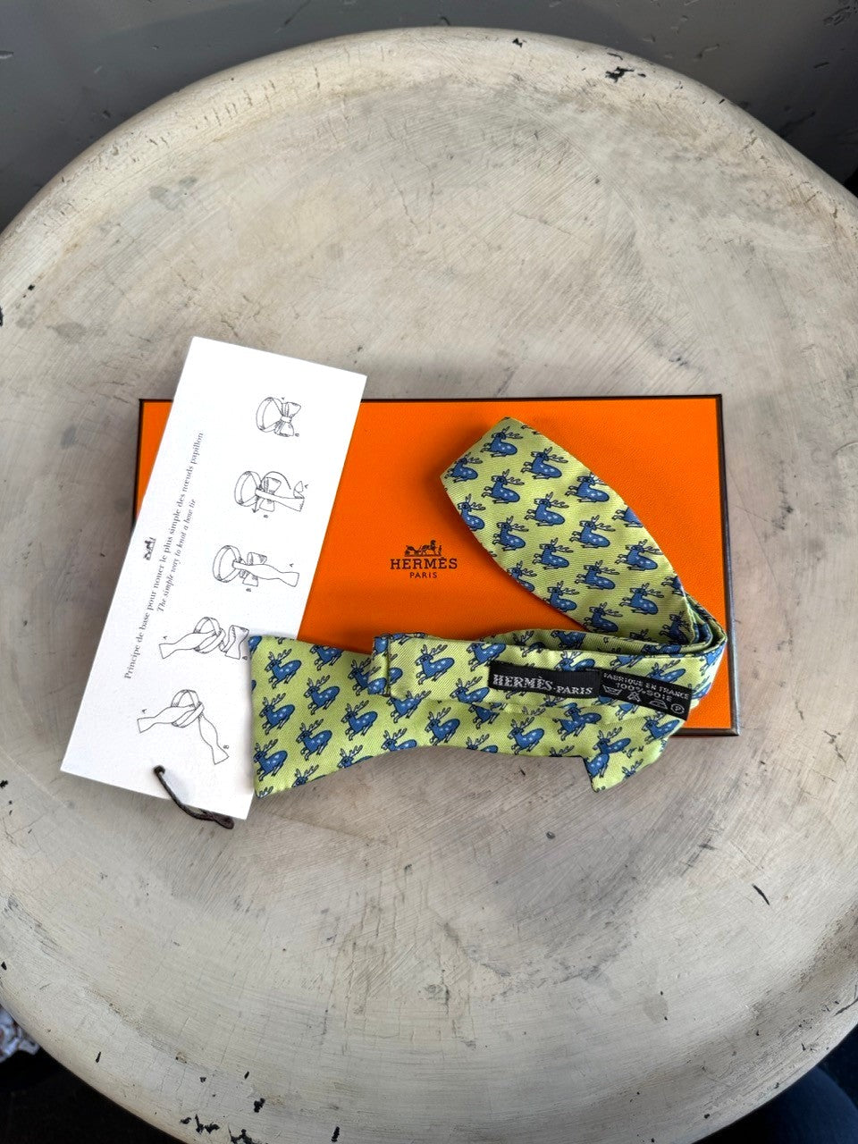 BERLIN VINTAGE CORNER lime green silk bow tie with blue leaping deer pattern. Includes instructions and Hermès box.