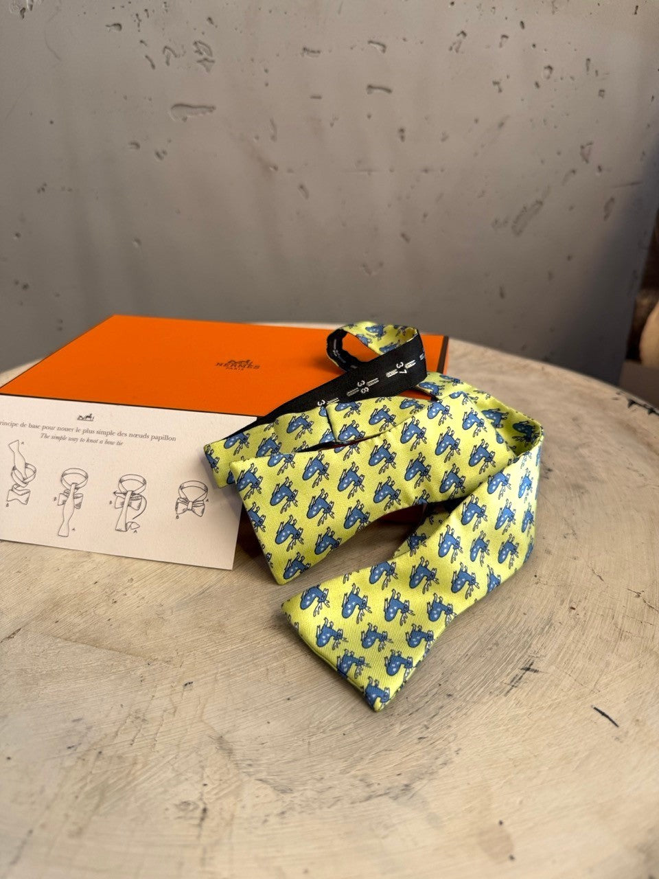 BERLIN VINTAGE CORNER lime green silk bow tie with blue deer pattern and black band. Includes instructions.