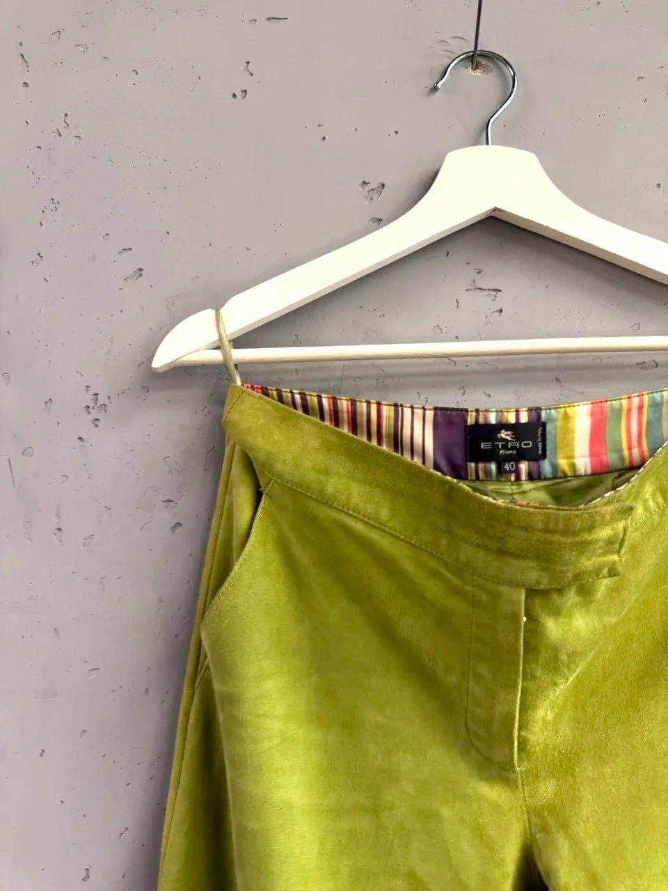 BERLIN VINTAGE CORNER lime green suede wide leg trousers with colorful striped interior waistband.