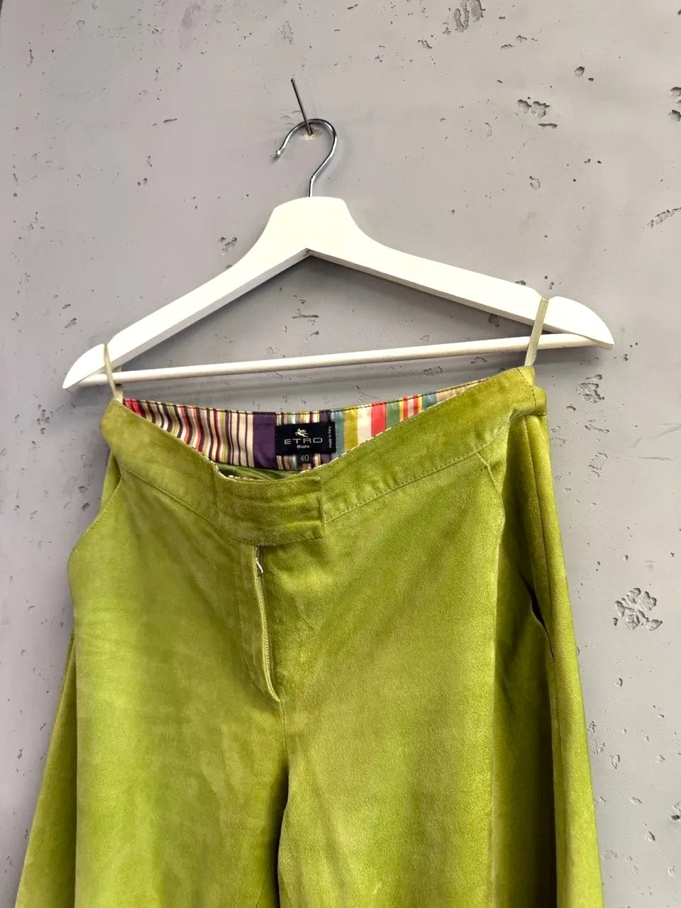 BERLIN VINTAGE CORNER lime green suede wide leg trousers with colorful striped interior waistband.