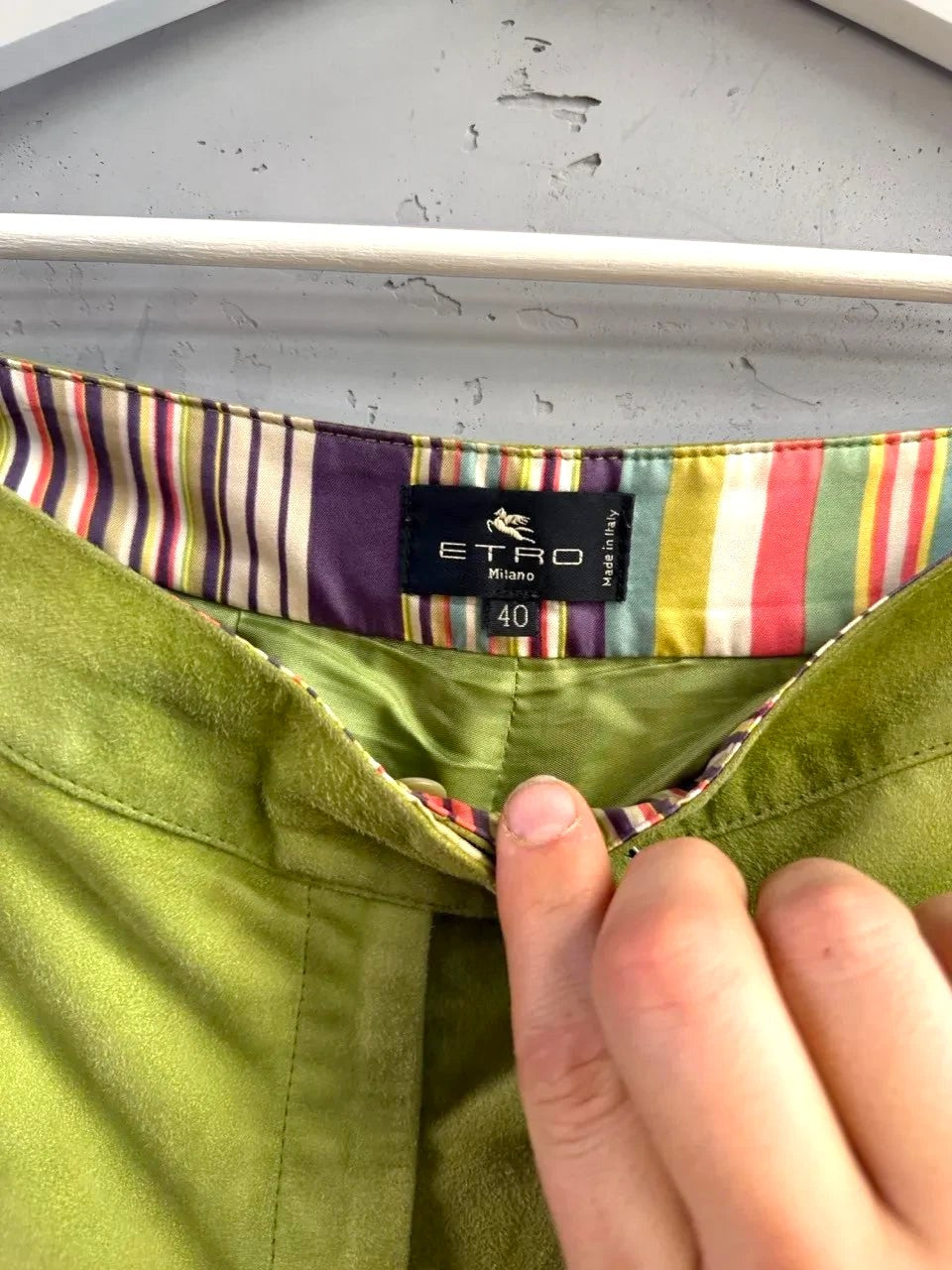 BERLIN VINTAGE CORNER lime green suede wide leg trousers with colorful striped interior waistband.