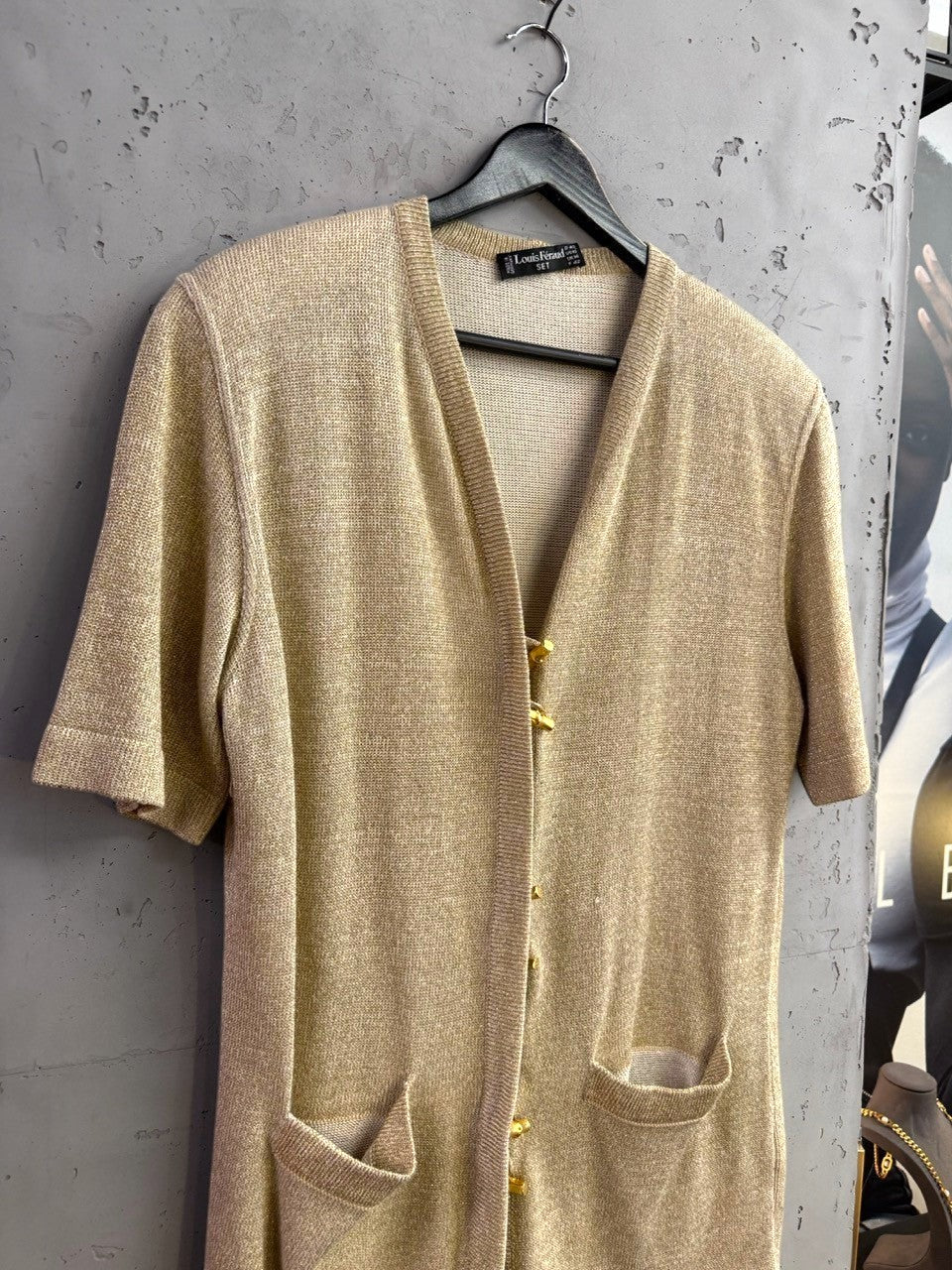 BERLIN VINTAGE CORNER Louis Féraud metallic gold short-sleeve knit cardigan with V-neck and front patch pockets.