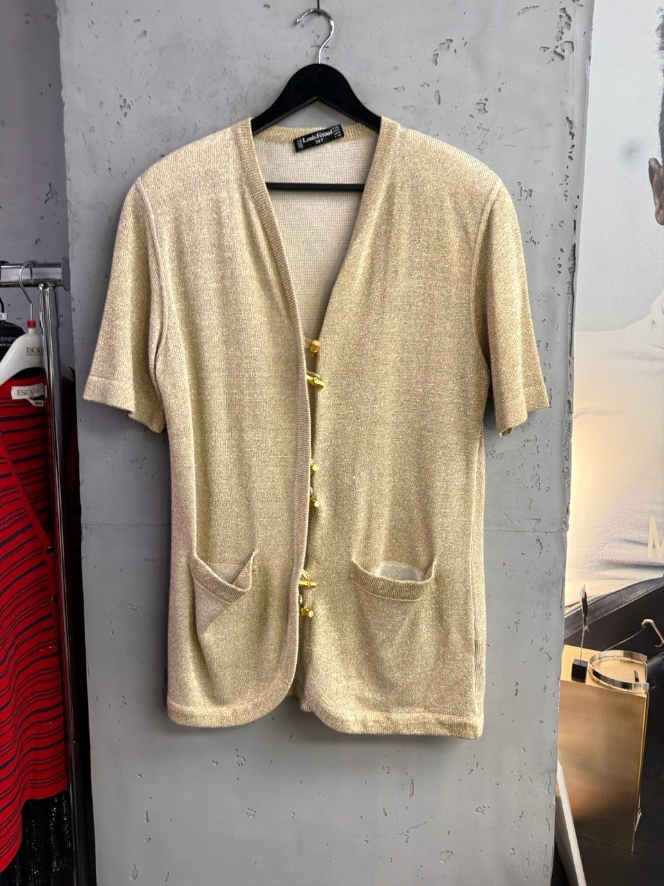 BERLIN VINTAGE CORNER Louis Féraud metallic gold short-sleeve knit cardigan with gold-tone hardware and patch pockets.