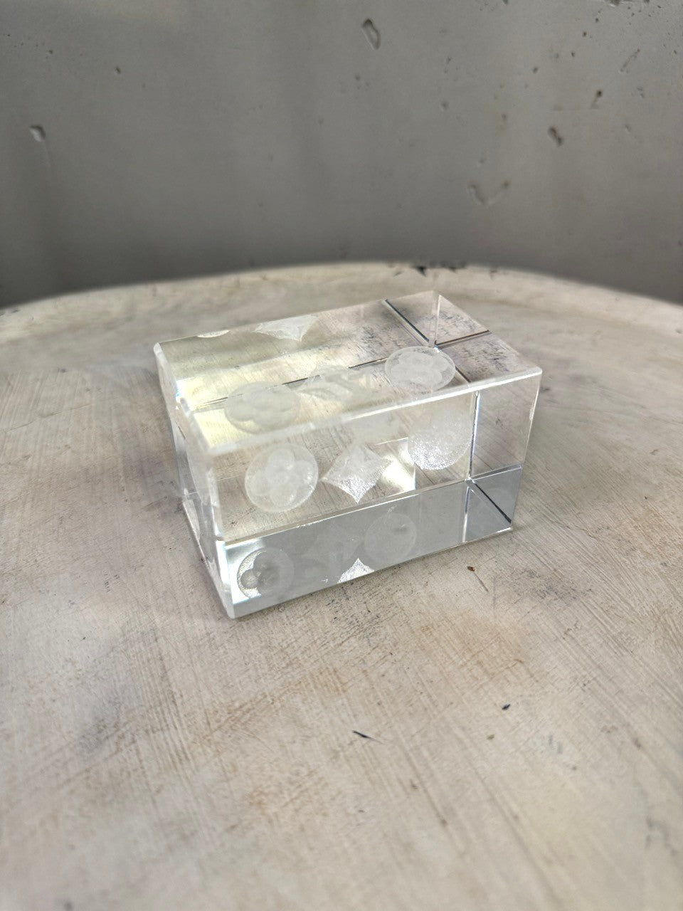 BERLIN VINTAGE CORNER clear crystal cube paperweight with etched Louis Vuitton monogram and floral motifs.