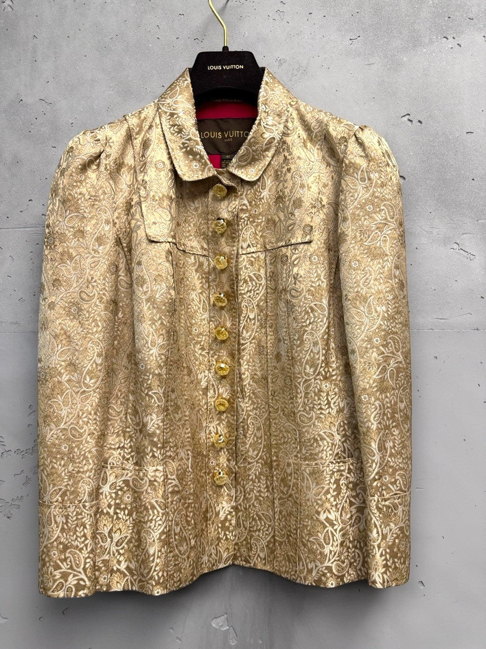 BERLIN VINTAGE CORNER Louis Vuitton gold brocade paisley jacket with ornate buttons and puff sleeves. Fuchsia lining.