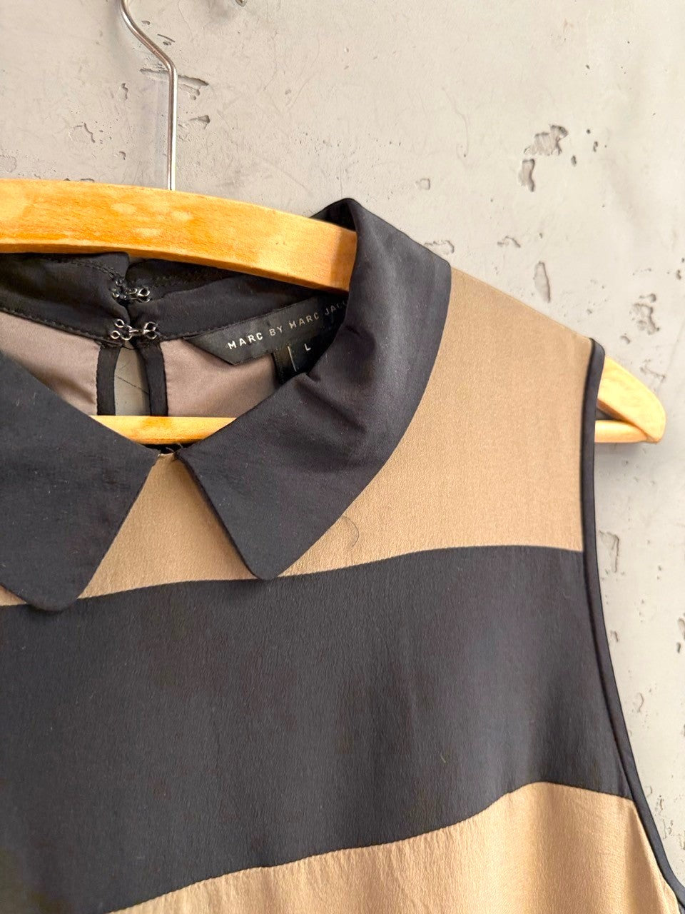 BERLIN VINTAGE CORNER Marc by Marc Jacobs sleeveless dress with a black and tan striped pattern and Peter Pan collar.
