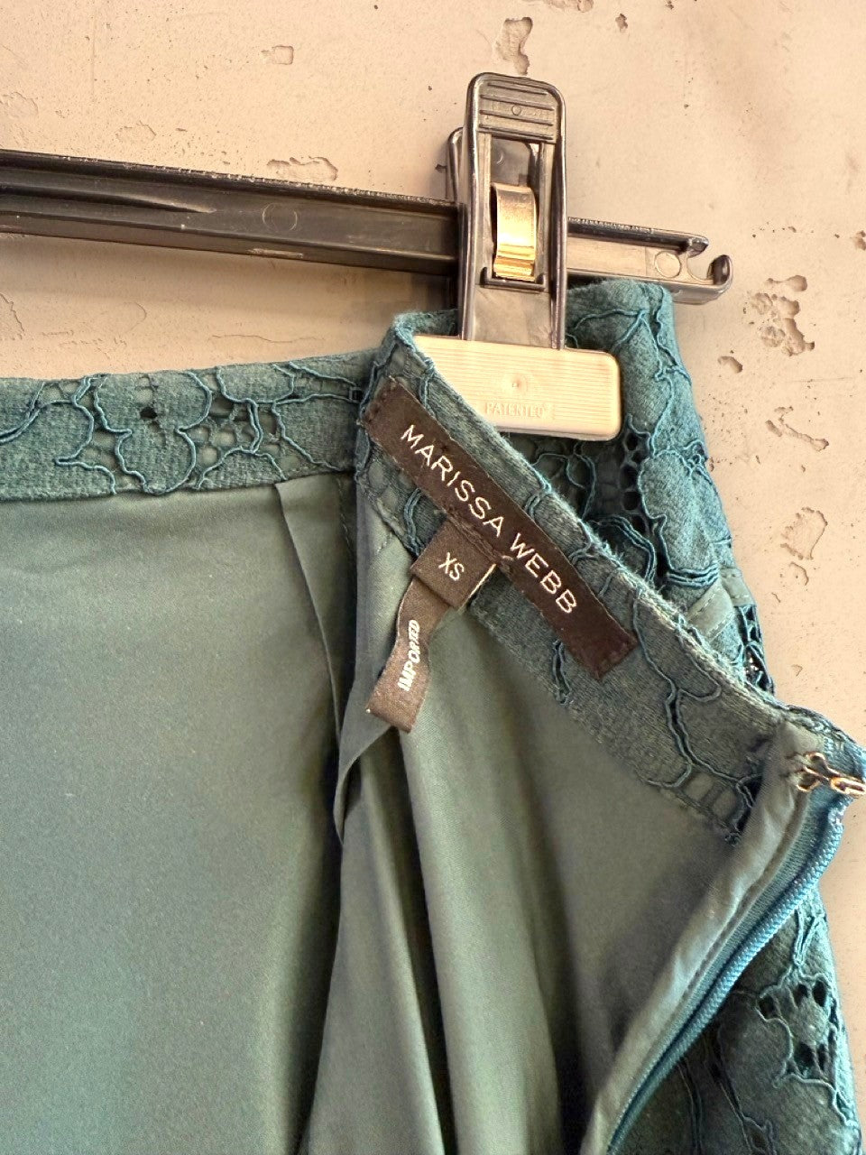 BERLIN VINTAGE CORNER Marissa Webb teal lace mermaid midi skirt with floral detail and hidden zipper.