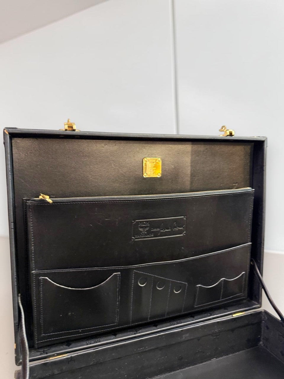 BERLIN VINTAGE CORNER MCM black leather hard shell briefcase interior with gold hardware and organizer pockets