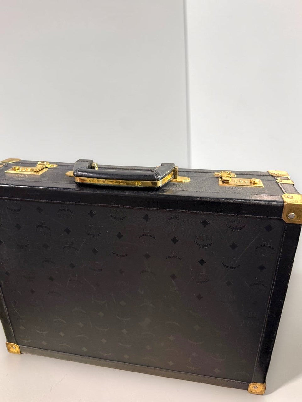 BERLIN VINTAGE CORNER MCM black leather hard shell briefcase with monogram pattern and gold-tone hardware