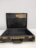 BERLIN VINTAGE CORNER MCM vintage black leather hard shell briefcase with gold hardware and organized interior