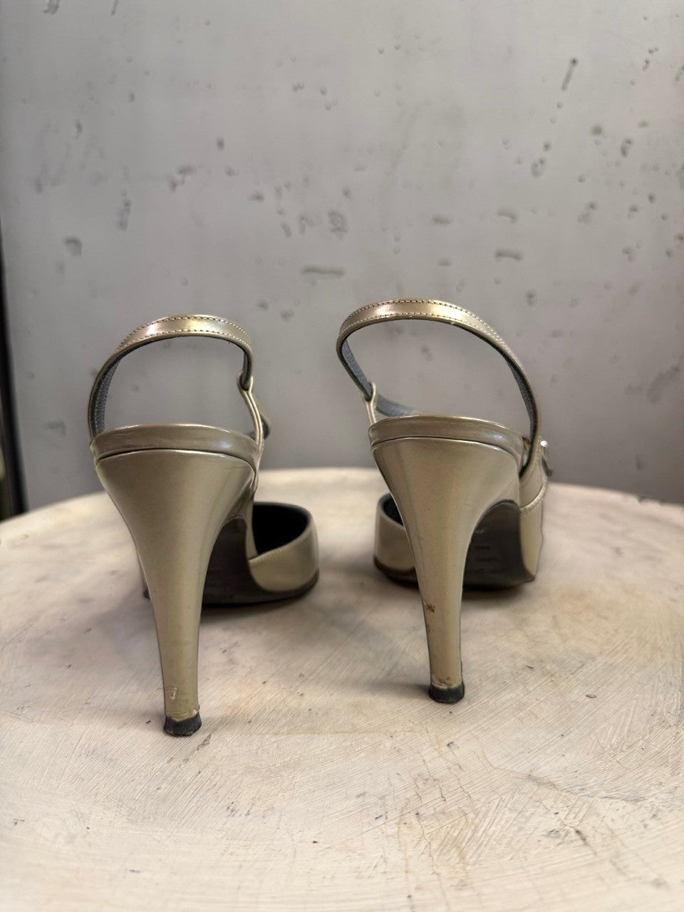 BERLIN VINTAGE CORNER metallic taupe leather slingback pointed toe heels with adjustable straps.