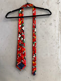BERLIN VINTAGE CORNER red Mickey Mouse novelty necktie with all-over character print on a black hanger