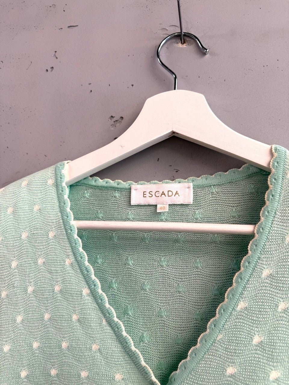 BERLIN VINTAGE CORNER mint green knit cardigan with white polka dots and scalloped trim.