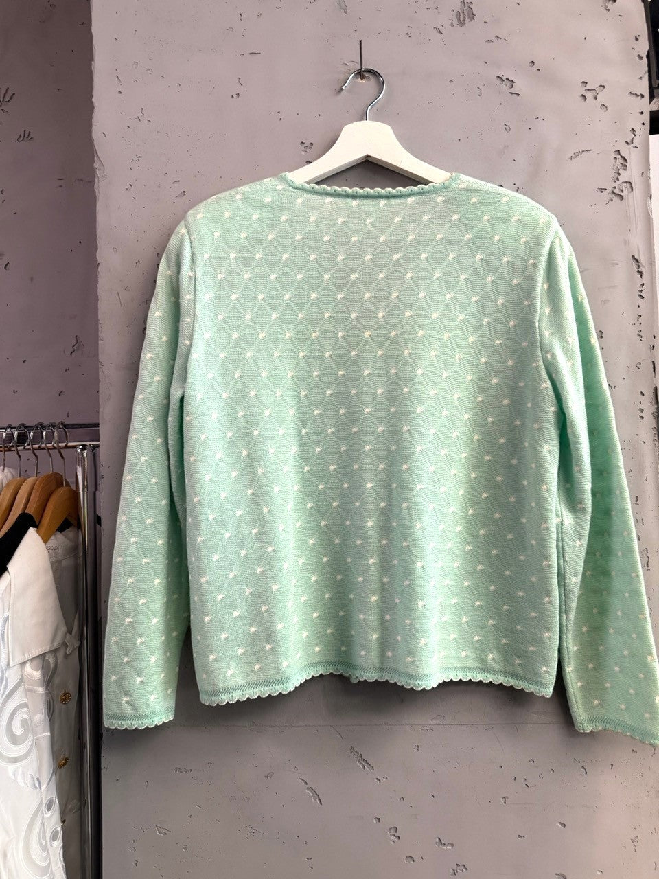 BERLIN VINTAGE CORNER mint green knit cardigan with white polka dots and scalloped trim.