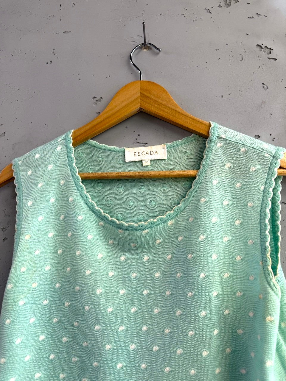 BERLIN VINTAGE CORNER mint green knit sleeveless top with white polka dots and scalloped trim.