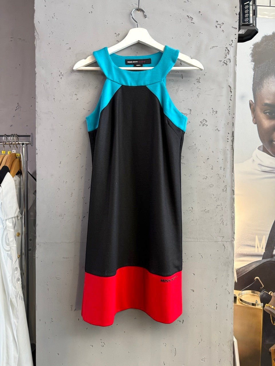 BERLIN VINTAGE CORNER Miss Sixty sleeveless color block mini dress in black with turquoise neckline and red hem.
