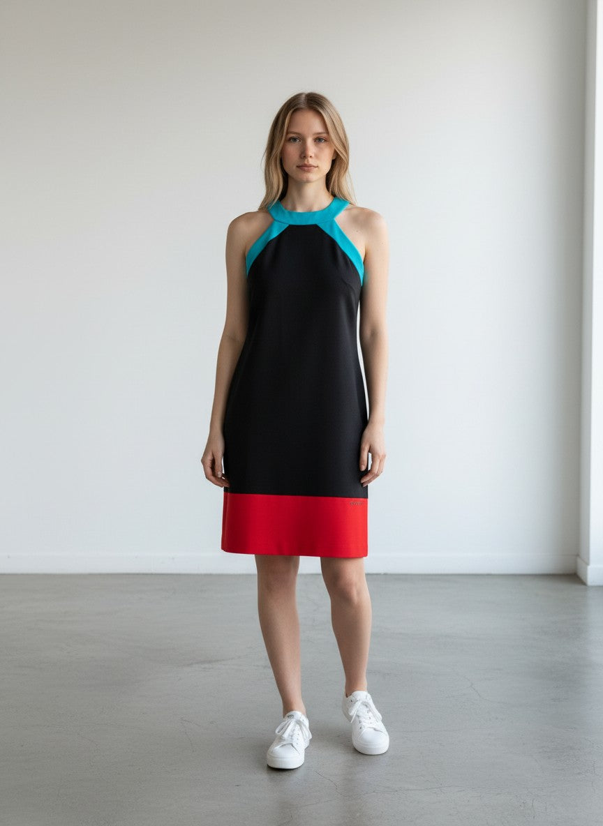 BERLIN VINTAGE CORNER Miss Sixty sleeveless black mini dress with turquoise neckline and red hem. Architectural neckline.