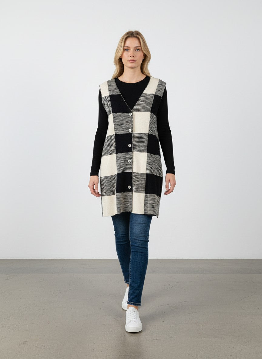 BERLIN VINTAGE CORNER Missoni sleeveless knit vest with black, white, and cream checkerboard pattern, V-neck, and shell buttons.