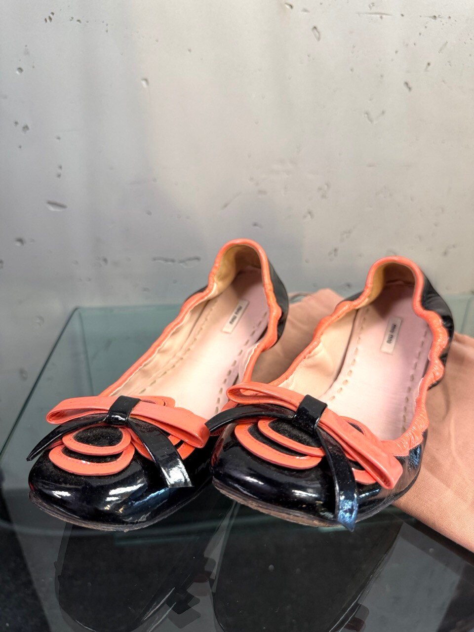 Miu Miu ballet flats with dust bag, pair seen from above