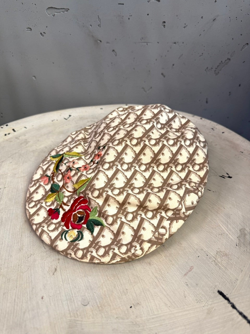 BERLIN VINTAGE CORNER beige and brown monogram canvas flat cap with vibrant floral embroidery detailing