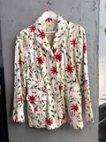 BERLIN VINTAGE CORNER Moschino denim blazer in off-white with red and green floral print and structured tailored fit.