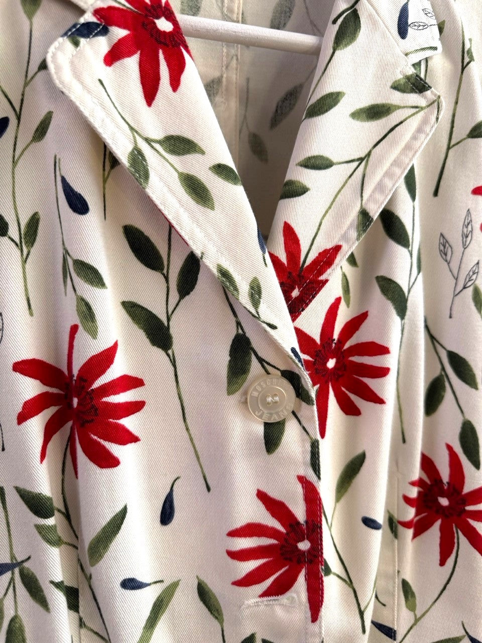BERLIN VINTAGE CORNER Moschino denim blazer in off-white with red and green floral print and branded button detail
