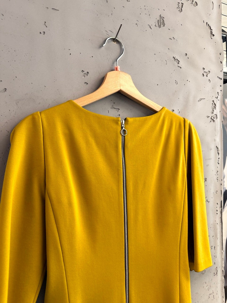 BERLIN VINTAGE CORNER mustard yellow midi sheath dress with boat neck, elbow sleeves, and silver zipper detail.