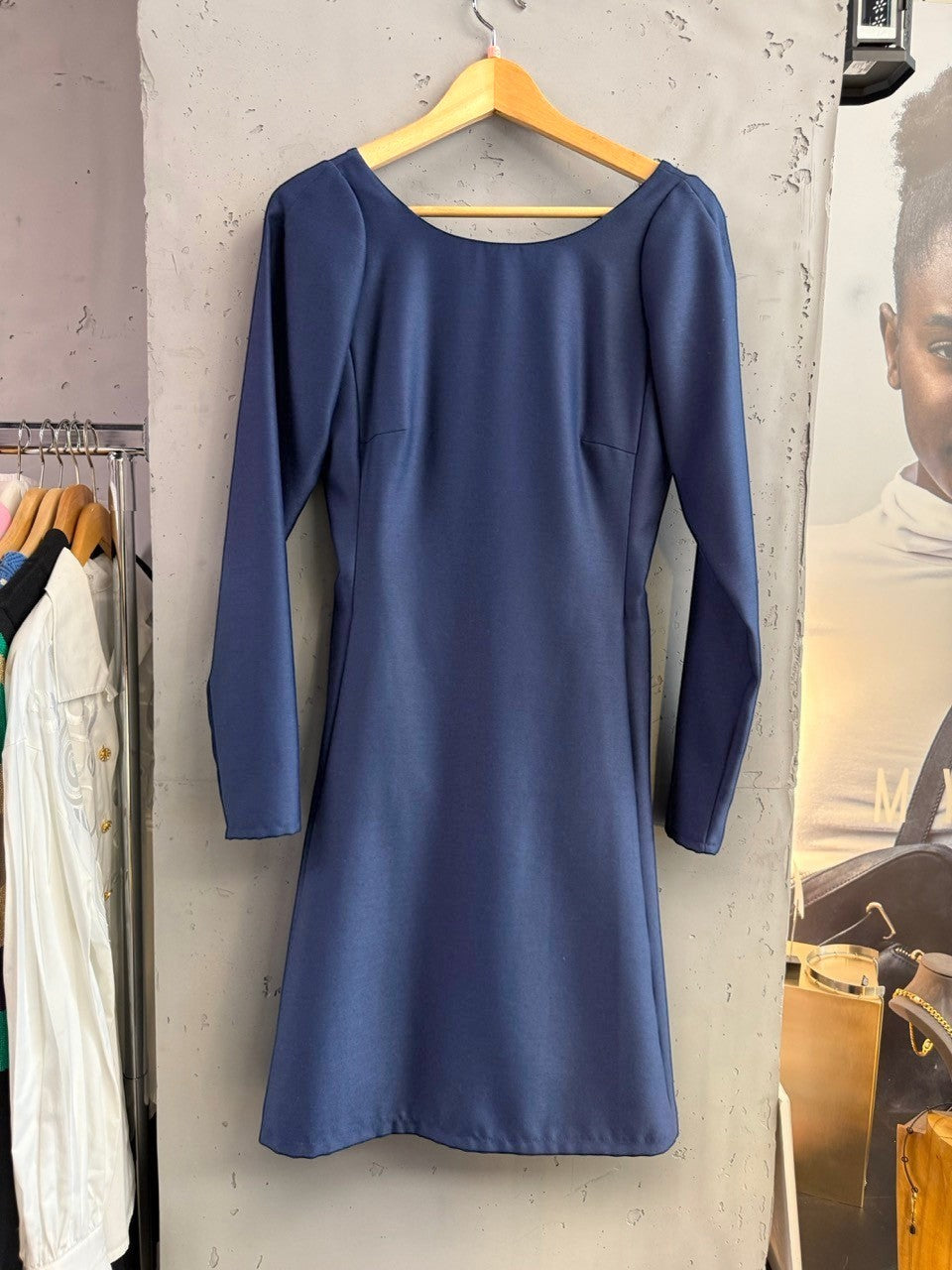 BERLIN VINTAGE CORNER navy blue A-line dress with long sleeves and a scoop back neckline.