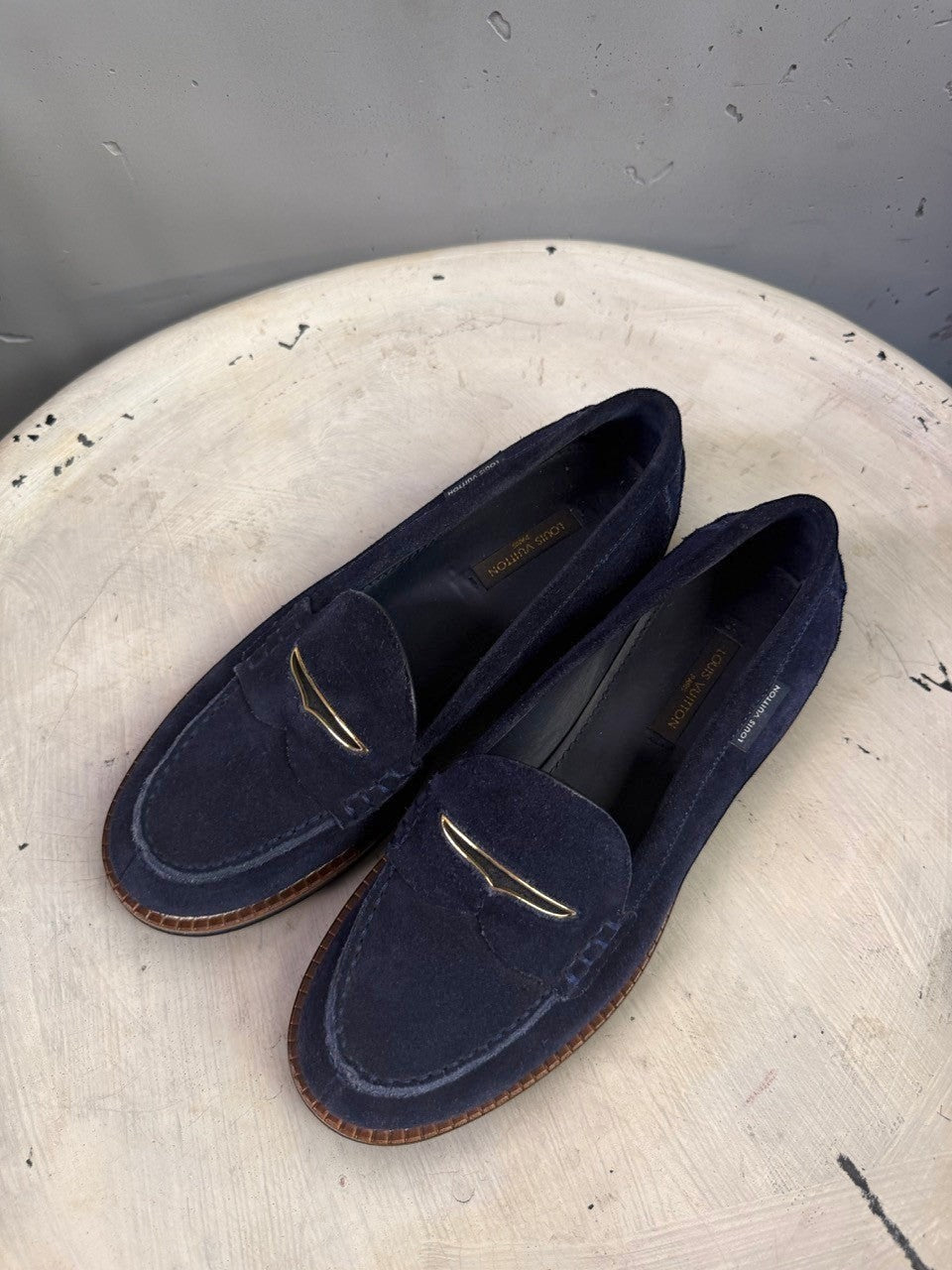 BERLIN VINTAGE CORNER navy blue suede Louis Vuitton penny loafers with metallic bridge accent and contrast stitching.