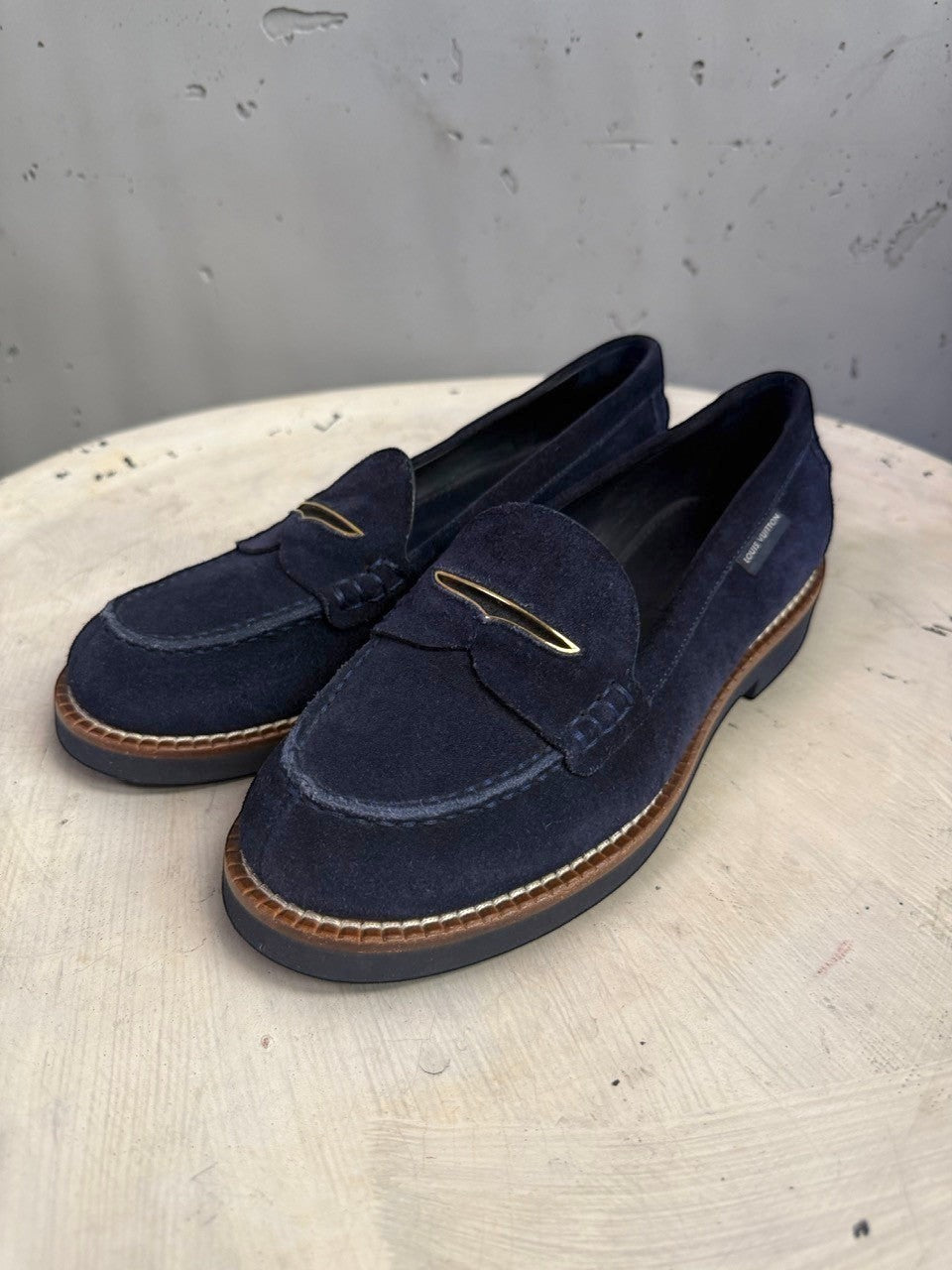BERLIN VINTAGE CORNER navy blue suede Louis Vuitton penny loafers with metallic bridge accent and contrast stitching.