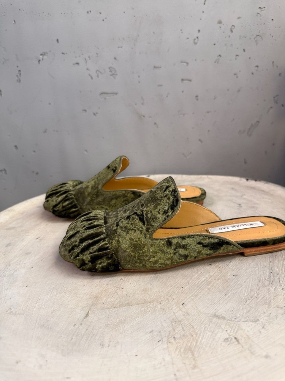 BERLIN VINTAGE CORNER olive green velvet ruched mule flats with pointed toe and ruffle detail.
