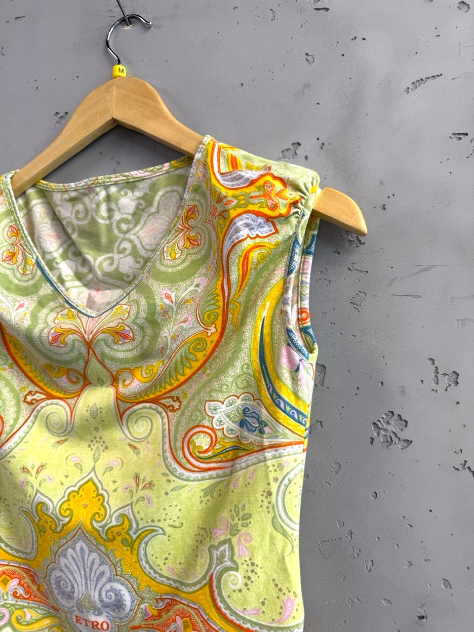 BERLIN VINTAGE CORNER sleeveless top with vibrant lime green, yellow, orange, and pink paisley print. Soft fabric.