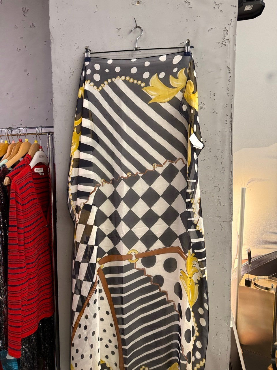 BERLIN VINTAGE CORNER lightweight scarf with black, white, and gold baroque, checkerboard, and polka dot print.