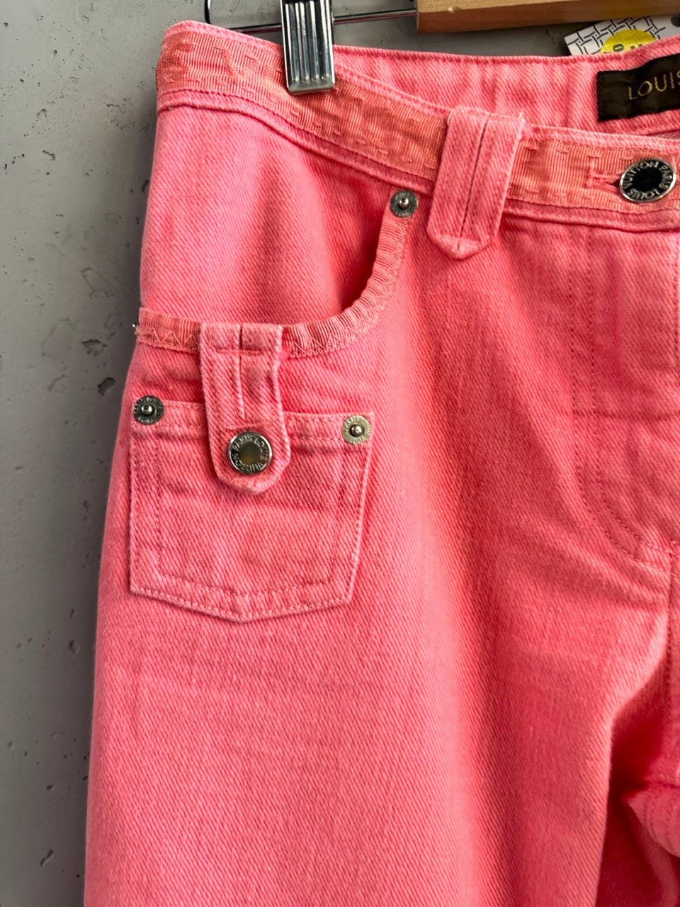 BERLIN VINTAGE CORNER pink cotton denim jeans with five-pocket design and textured waistband detail.