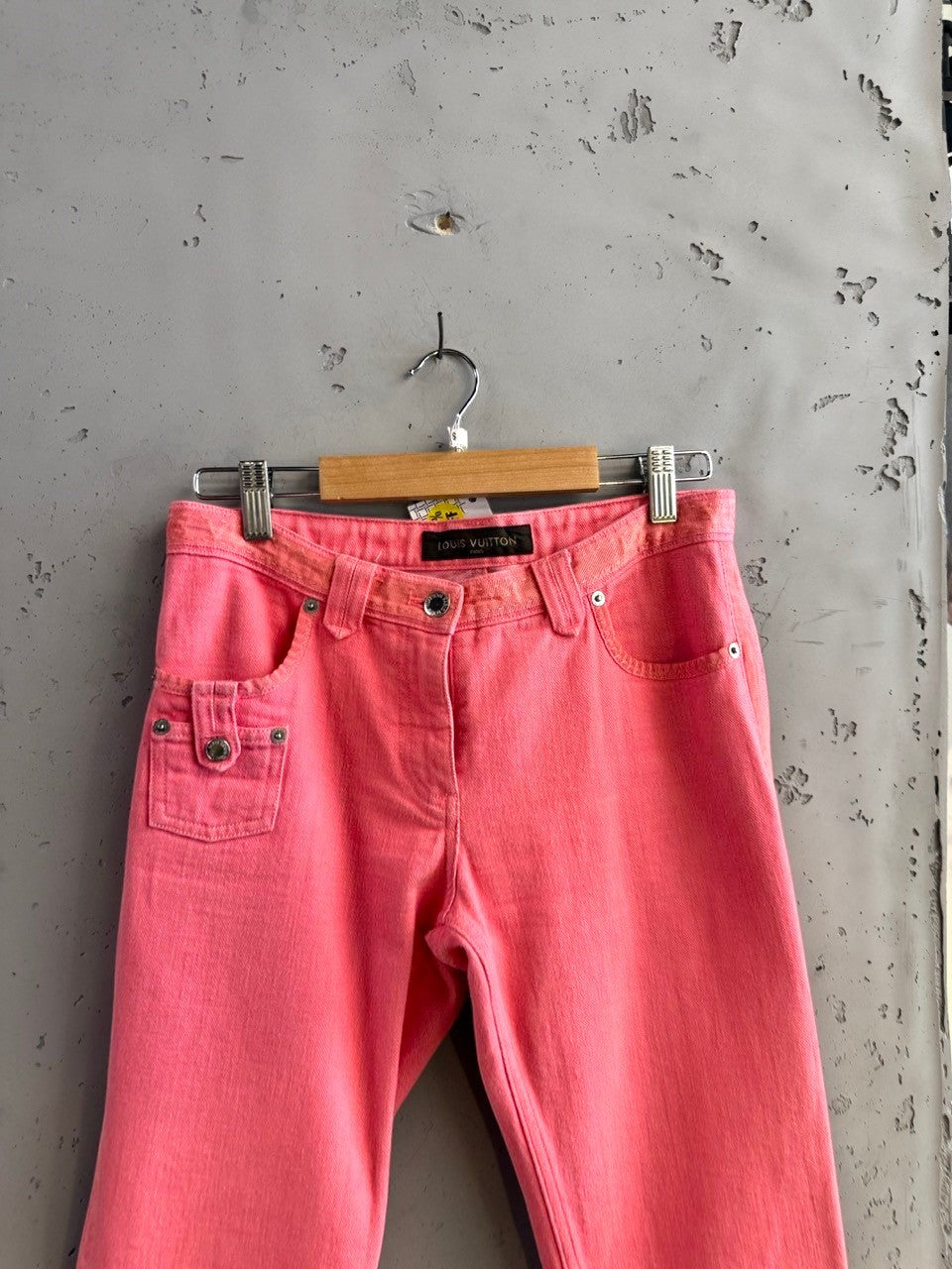 BERLIN VINTAGE CORNER pink cotton denim jeans with five-pocket design and textured waistband detail.