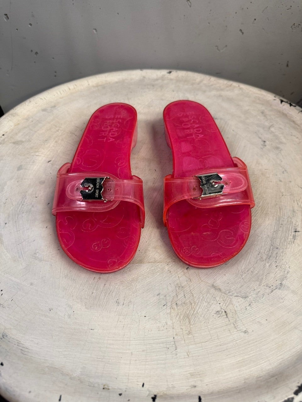 BERLIN VINTAGE CORNER pink jelly slide sandals with clear straps and silver-tone buckle featuring Escada Sport logo.
