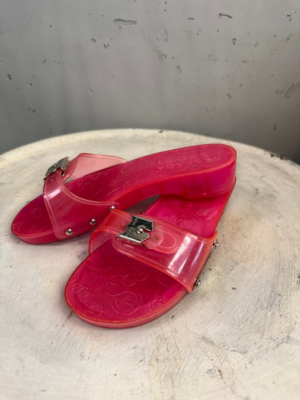 BERLIN VINTAGE CORNER pink PVC jelly slide sandals with silver-tone buckle and Escada Sport logo.