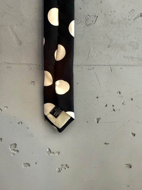 BERLIN VINTAGE CORNER black silk tie with white polka dots and a sunflower pattern