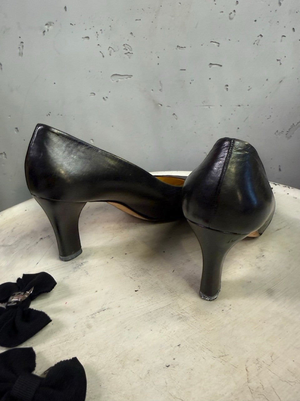 BERLIN VINTAGE CORNER black leather Prada high heel pumps featuring a classic silhouette and mid-height heel