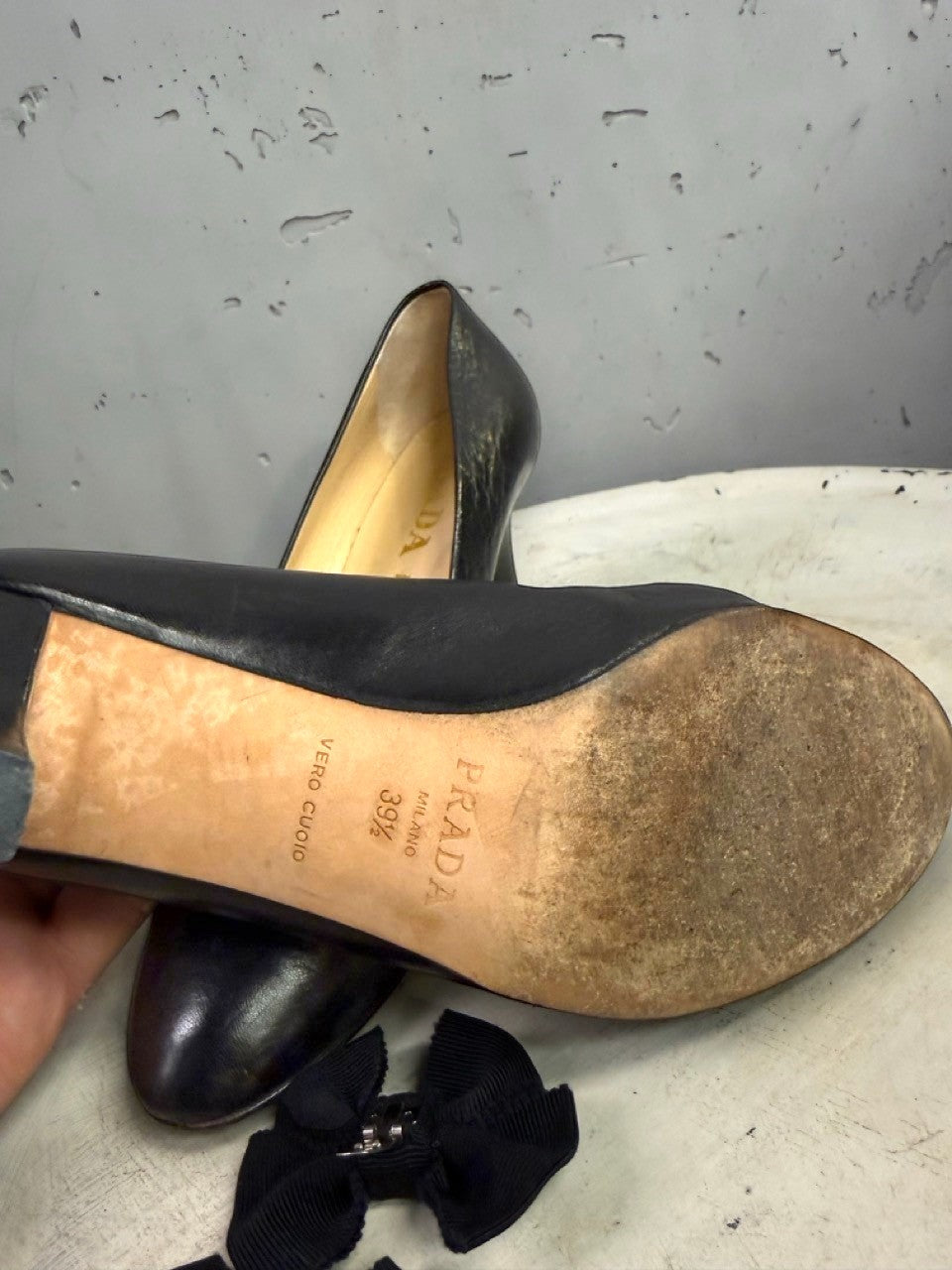 BERLIN VINTAGE CORNER Prada black leather high heel pumps with almond toe and branded leather sole