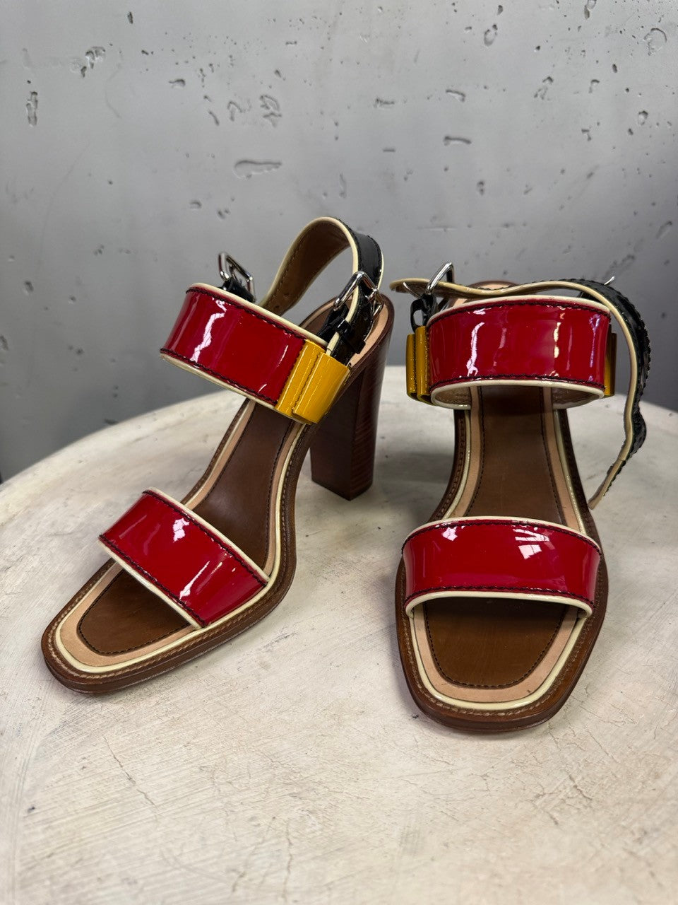 BERLIN VINTAGE CORNER Prada multi-colored patent leather block-heel sandals with adjustable ankle straps.