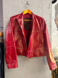 BERLIN VINTAGE CORNER Prada red leather biker jacket with white contrast stitching and gold-tone zips.