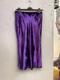 BERLIN VINTAGE CORNER deep purple satin midi skirt with decorative waistband and fluid silhouette.