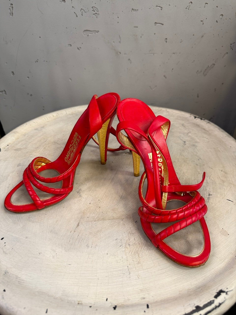 BERLIN VINTAGE CORNER red leather strappy high heel sandals with gold accents and braided detail.