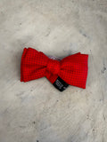 BERLIN VINTAGE CORNER red 100% silk bow tie with black polka dots and adjustable strap.