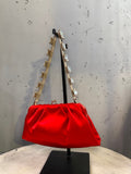 BERLIN VINTAGE CORNER red satin ruched evening clutch with ornate gold chain strap embellished with crystals.