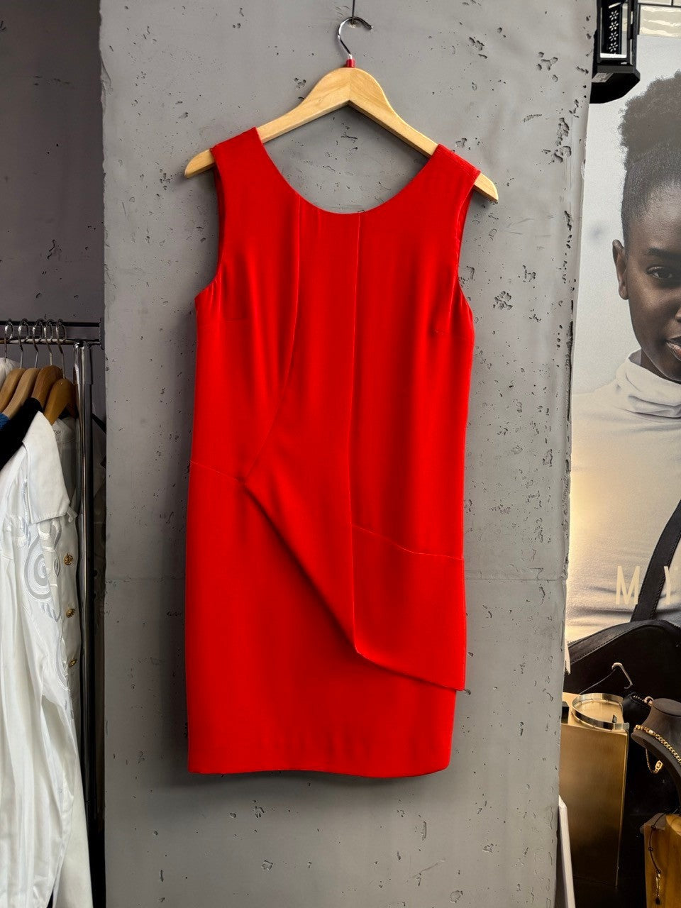 BERLIN VINTAGE CORNER red sleeveless V-neck dress with asymmetrical draped overlay and darting details.