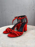 BERLIN VINTAGE CORNER Alexander Wang red suede block heel sandals with cage-style ankle straps and metallic heel detail.