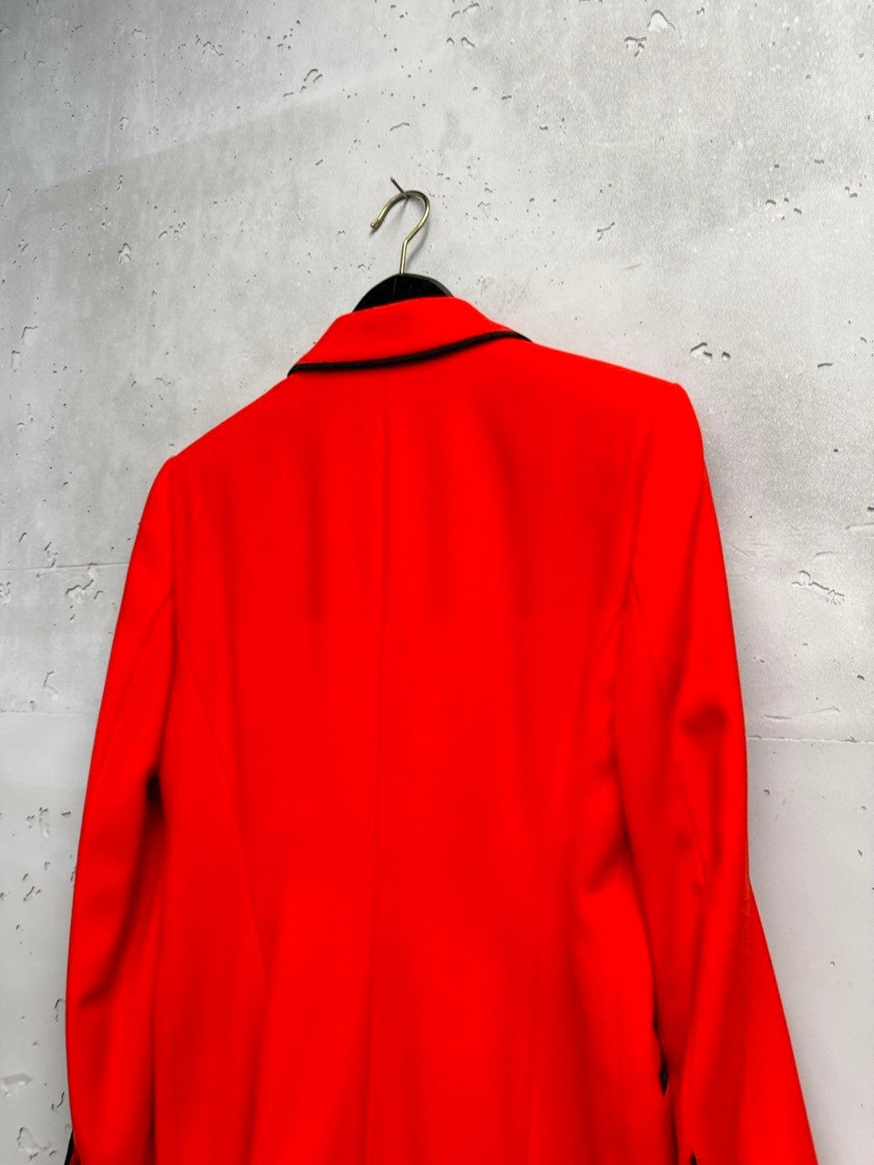 BERLIN VINTAGE CORNER vibrant red wool blend double-breasted blazer with black piping and button details.
